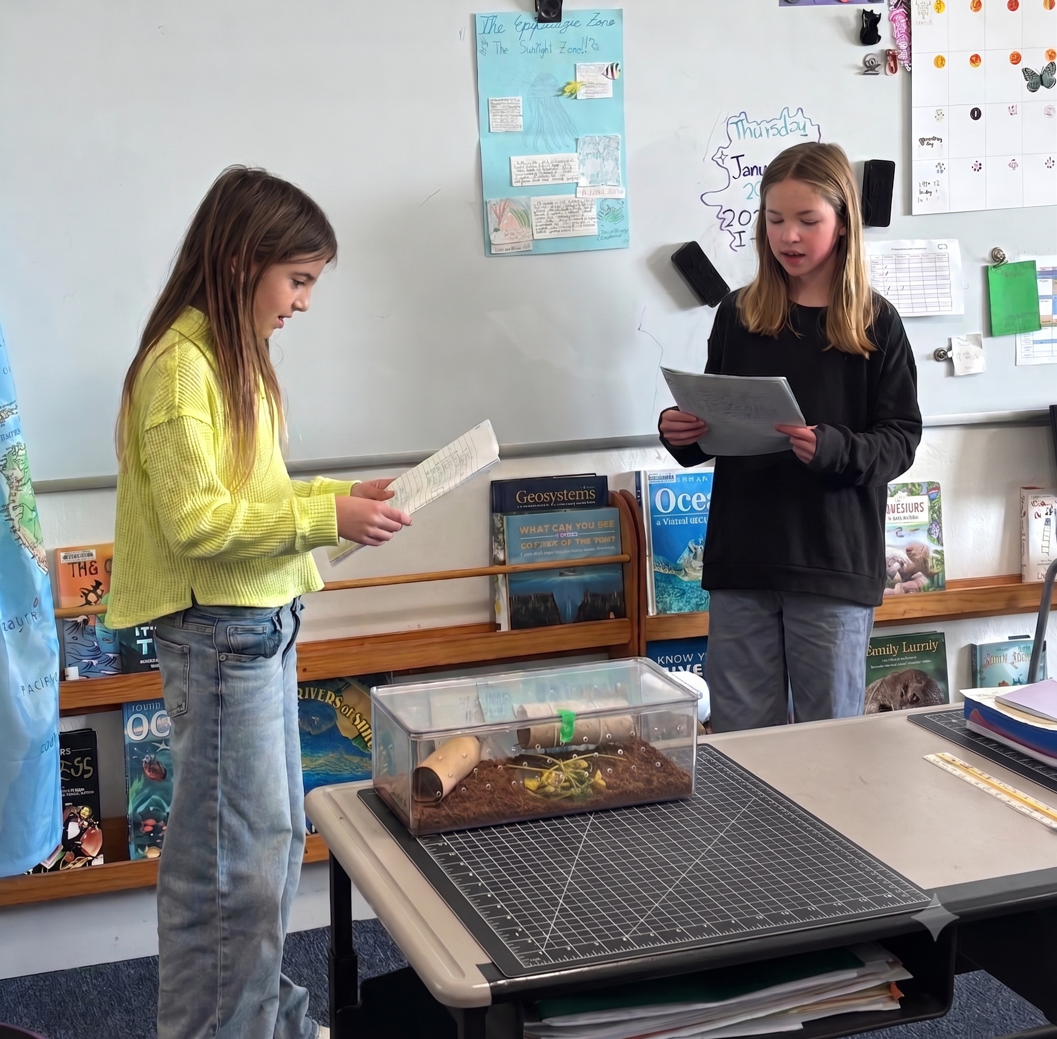 Students presenting their ocean-zone inquiry project to classmates
